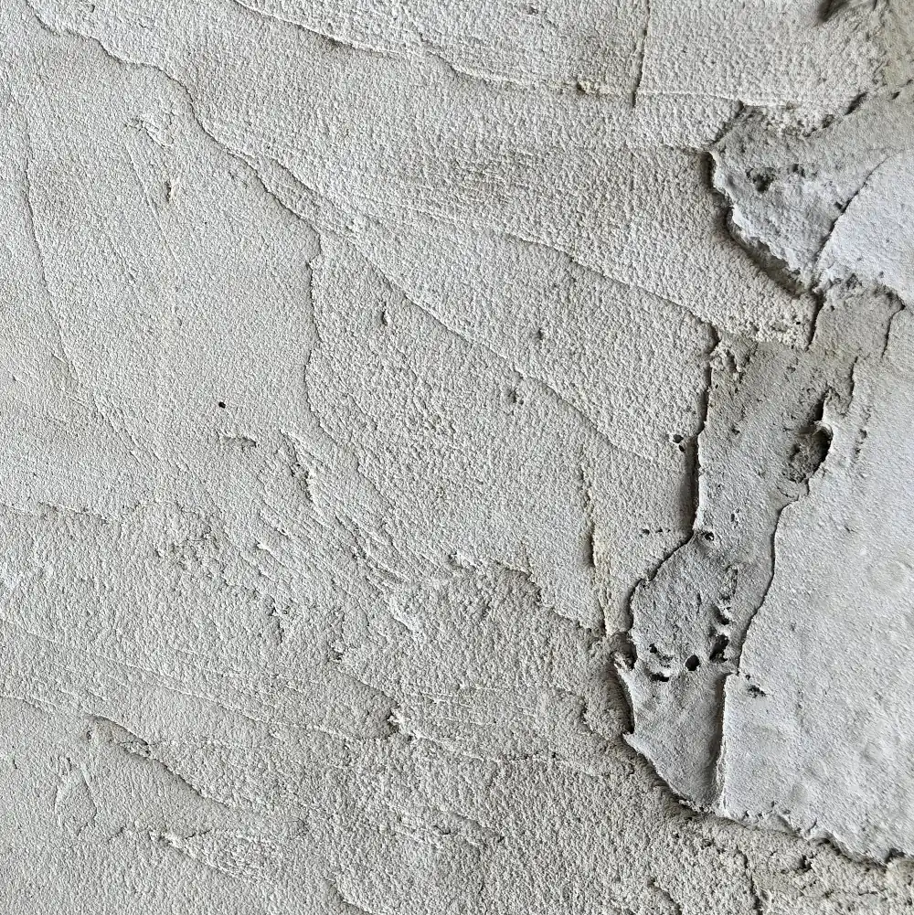Dekoratives Bild einer rauh verputzten Wand Dekoratives Bild einer rauh verputzten Wand
